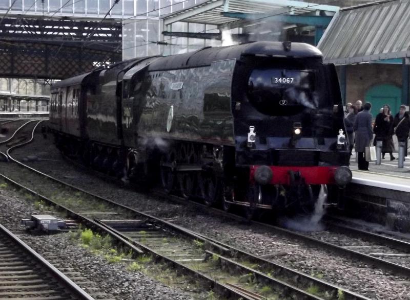 34067 at Carlisle: Ex SR Battle of Britain 34067 Tangmere has arrived at Carlisle with the Northern Belle Settle and Carlisle Steam Special from York on 2nd April 2022. Photo of 34067 at Carlisle