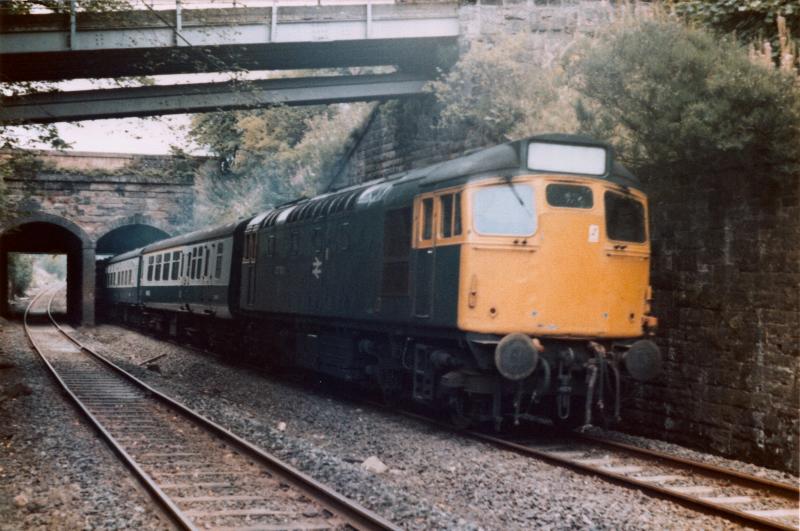Class 27101 Lochburn Twin Tunnels: Class 27101 heads a Fort William to Glasgow QT service on 16th August 1980 passing the Lochburn twin tunnels with Forth & Clyde canal above. Photo of Class 27101 Lochburn Twin Tunnels