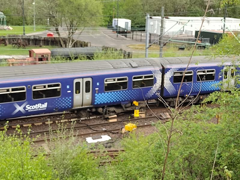 Jacked up: Boogie of 318265 is jacked up for rerailing. The unit derailed along with 320309 on the evening of 6th May 2022 while heading for the Whifflet line at Sunnyside Junction. Photo of Jacked up