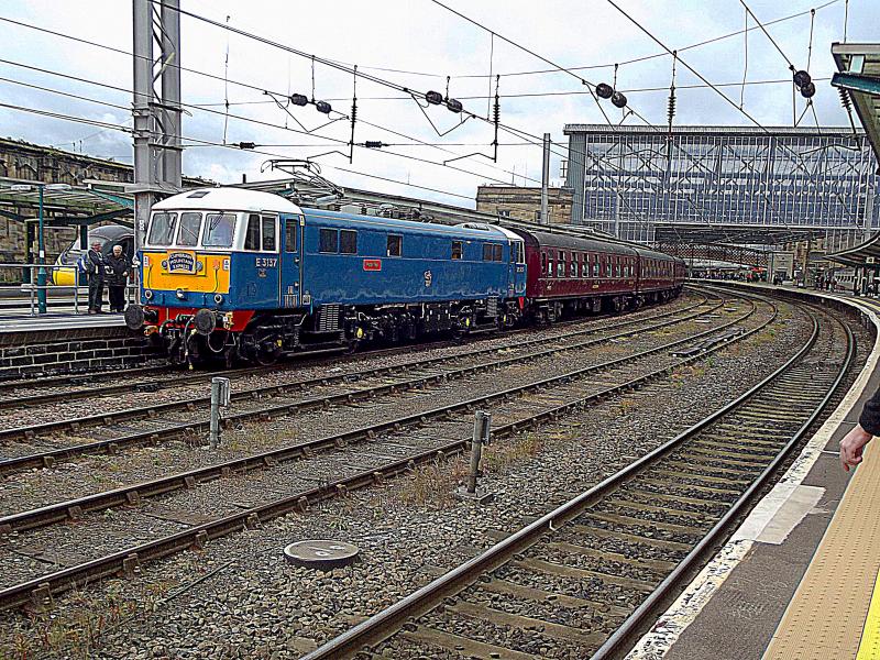 86259 at Carlsile: Ex BR class 86 E3137 or 86259 waits at Carlisle with its Railway Touring Company charter from London Euston to Carlisle, on 21st May 2022. 46115 was on the rear Photo of 86259 at Carlsile