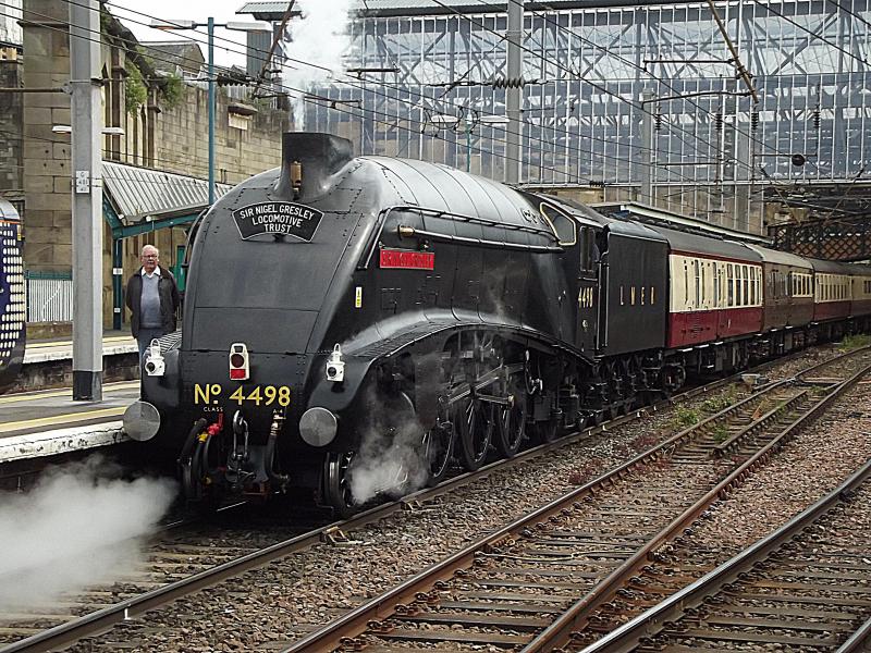 Sir Nigel Gresley at Carlsile: Wearing its black livery and LNER running number 4498 or 60007 Sir Nigel Gresley arrives at Carlisle with a Private Charter from Crewe via Settle, on 21st May 2022. 47614 is on the rear. Photo of Sir Nigel Gresley at Carlsile