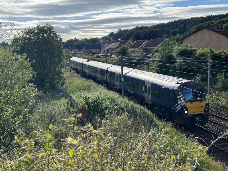 334038 Bathgate: 334038 runs wrong line out of Bathgate with 5V38 1835 Bathgate LMD to Edinburgh Waverley empty stock train. Photo of 334038 Bathgate