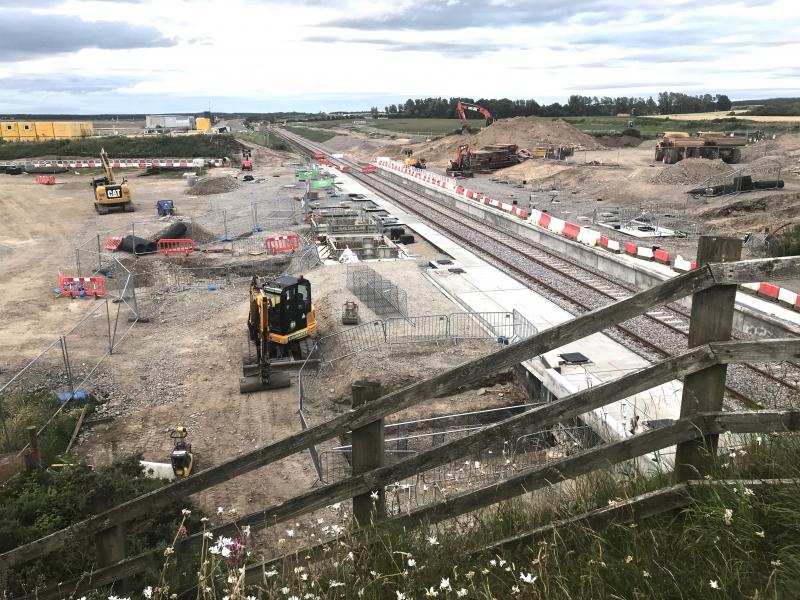 Photo of Dalcross station platforms and track formation.