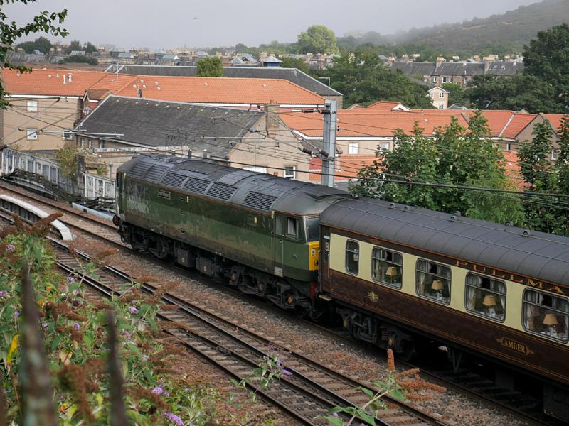 Calton 47815: 47815 Great Western brings up the rear of the empty stock for the returning Northern Belle to Liverpool from Joppa Straight towards the Calton Tunnels on 13 August 2022. It will lead the southbound train via the 'sub'. Photo of Calton 47815