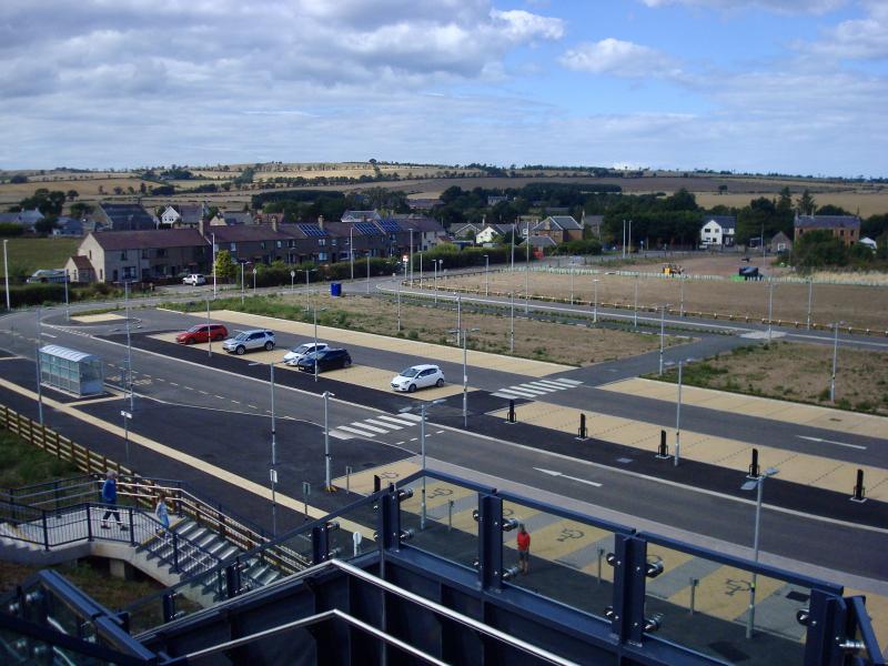 Reston Station Car Park This Afternoon: Very lightly used car park. One car hooked up to an electric charger. Photo of Reston Station Car Park This Afternoon
