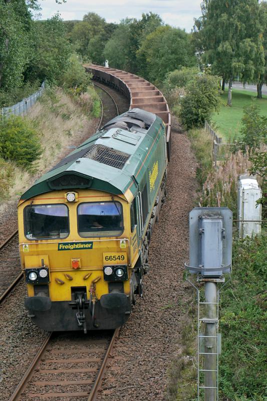Dunfermline 66: 66549 nears Dunfermline Town with the Thornton Yard - Ravenstruther ballast empties on 14 September. Thanks to the driver for the Toot. Photo of Dunfermline 66