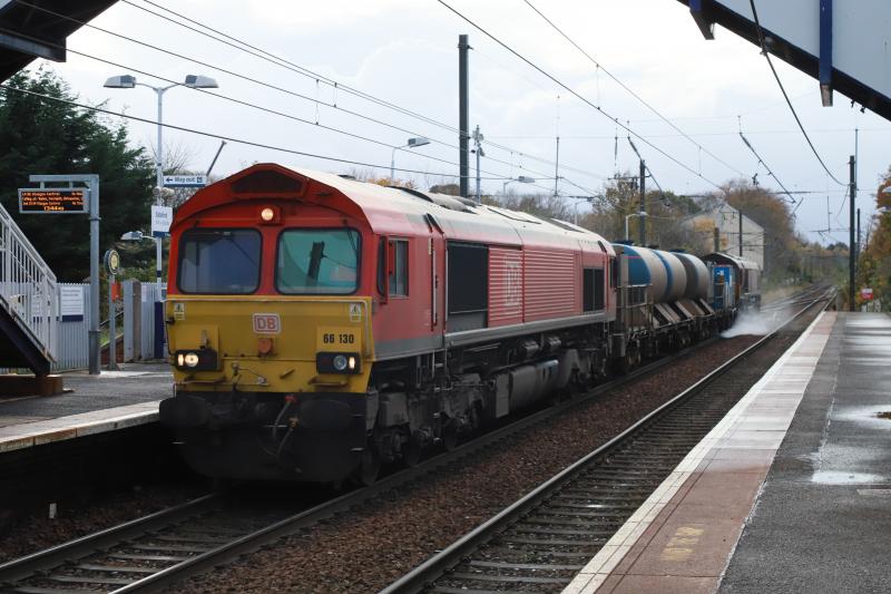 Clean 66 on RHTT: DB Red 66130 on 3S93 07.48 Stirling to Slateford Depot spraying in Slateford Station on 01/11/2022 Photo of Clean 66 on RHTT