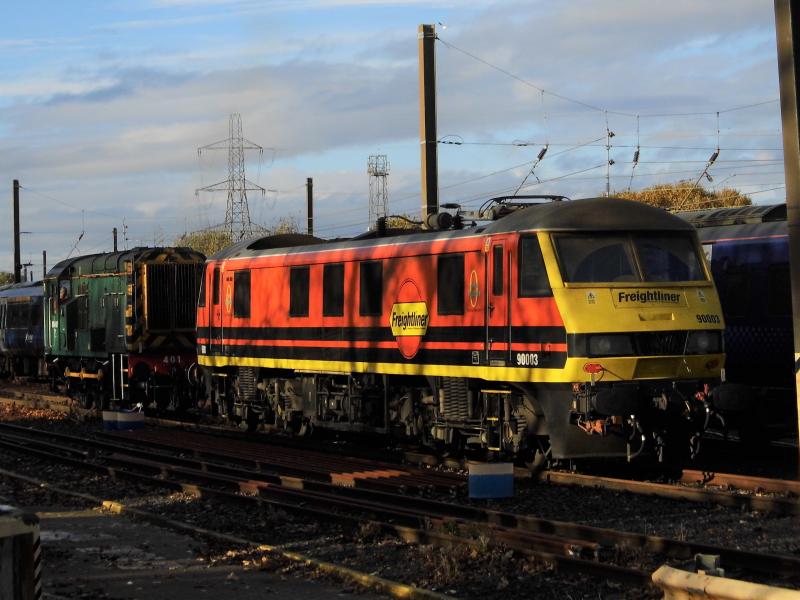 90003 Craigentinny wheel lathe: An unusual visitor to the Craigentinny wheel lathe is Freightliner orange livery 90003 shunted by 08401 at 1250 on 06/11/22 Photo of 90003 Craigentinny wheel lathe