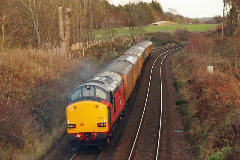 Photo of HNRC Orange 37607 on test train, 8th December 2022