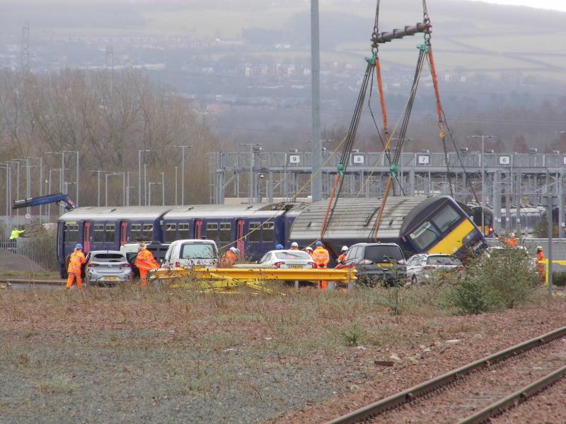 321402 Millerhill 200223: Car 77944 of unit 321402 is laid carefully at a 45 degree angle. Photo of 321402 Millerhill 200223