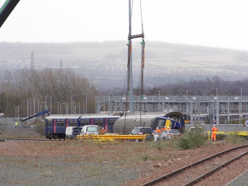 321402 Millerhill 200223: Car 77944 of unit 321402 in its final position lying on its side. This was achieved by around 1235. Photo of 321402 Millerhill 200223