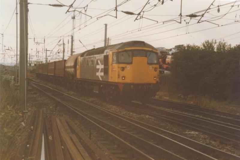 Railfreight grey Cl 26 leaves Mossend Yard: Railfreight grey Cl 26 leaves Mossend Yard with mixed freight. Photo of Railfreight grey Cl 26 leaves Mossend Yard