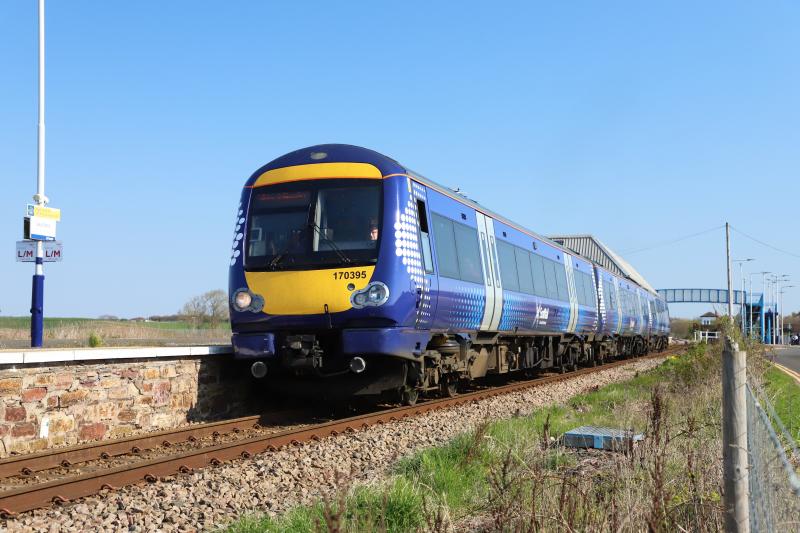 170 395 departing Leuchars: 170 395 at Leuchars station on 1L32 0942 Dundee to Edinburgh. 21st April 2023. Photo of 170 395 departing Leuchars