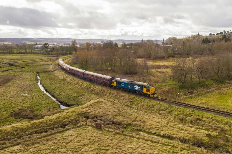 37403 'Isle of Mull'.: 37403 Isle of Mull departs Dingwall for Kyle of Lochalsh with the Branch Line Society Railtour. In the background is the line to Wick and Thurso. Photo of 37403 'Isle of Mull'.