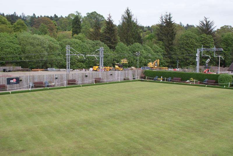 Photo of Looking across from Dunblane Bowling Club to the NR Compound and DB46 to the right