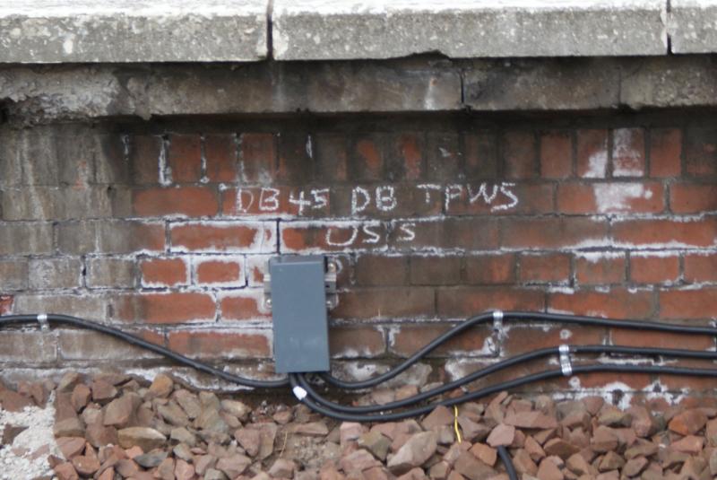 Photo of New Dunblane Down Main TWPS Overspeed Aerial pair joint box for trains that will crossover to the Up Main attached to the P.1 wall upstand.