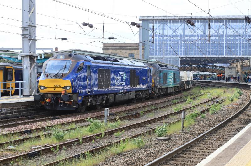 6M23: 68007 + 68003 with 4 wagons Hunterston to Sellafield waiting in Plat 3 Carlisle for 9 minutes. Platform busy on 19/05/2023 Photo of 6M23