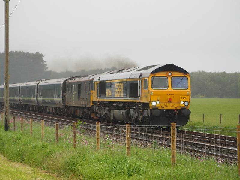 66744 Rescues Aberdeen Sleeper: 66744 Crossrail passes Bow of Fife LC with 73967 and 1A25/5A25 in tow Photo of 66744 Rescues Aberdeen Sleeper