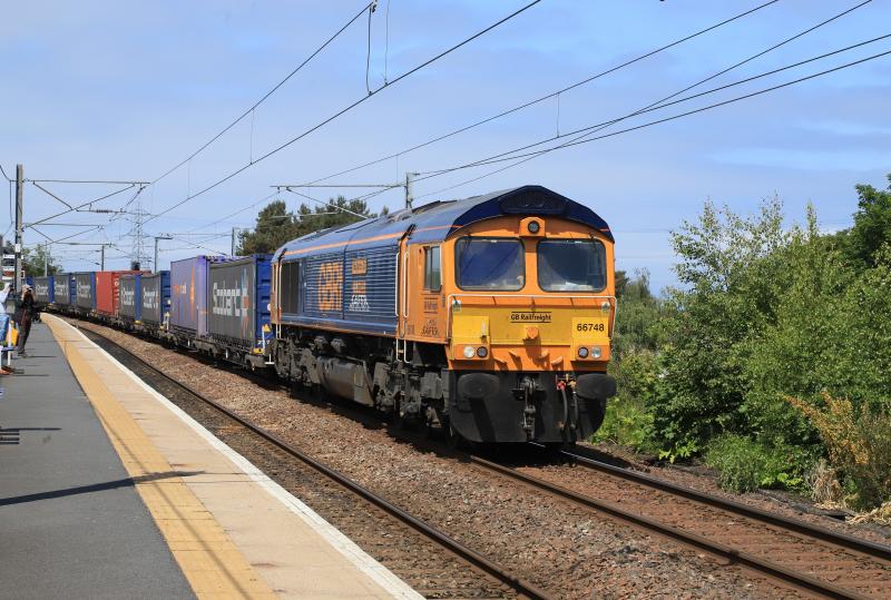 66748 Safer Think Before You Act: 66748 on 4E04 11..06 Mossend P.D. Stirling to Docaster Iport passing Newcraighall on 07/06/2023 Photo of 66748 Safer Think Before You Act