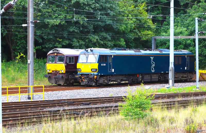 92038: 92038 stabled next to 66746 at the western end of Craigentinny Depot on 12/06/2023. Photo of 92038