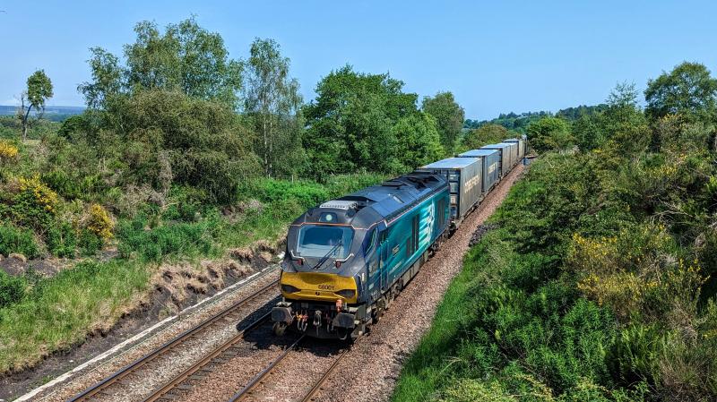 68001 4D01 at Ashfield: 68001 on Highland Spring water train from Blackford to Mossend at Ashfield north of Dunblane Photo of 68001 4D01 at Ashfield