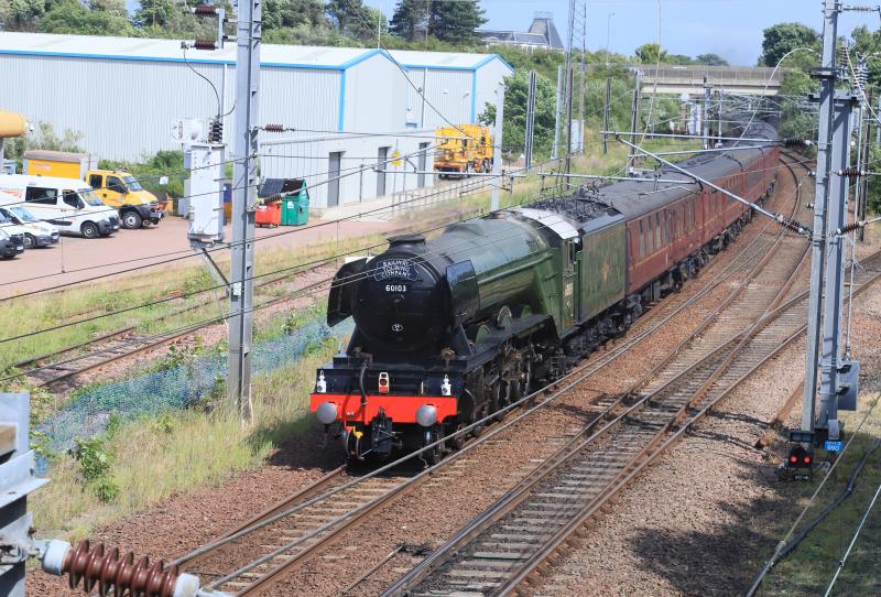 5Z49: 60103 being pushed by 47812 on the UP Line at Portobello Jct on 5Z49 15.19 Edinburgh to Joppa Straight on 01/07/2023. The train did not follow the timing on RTT. A class 170 passed 60103 so both trains were going in the same direction Photo of 5Z49