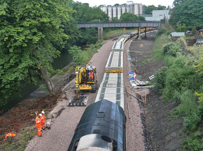 Cameron Bridge east end: DRS 66122 stands at the east end of Cameron Bridge yard with a trainload of sleepers which are being set out to extend the line. 5 July Photo of Cameron Bridge east end