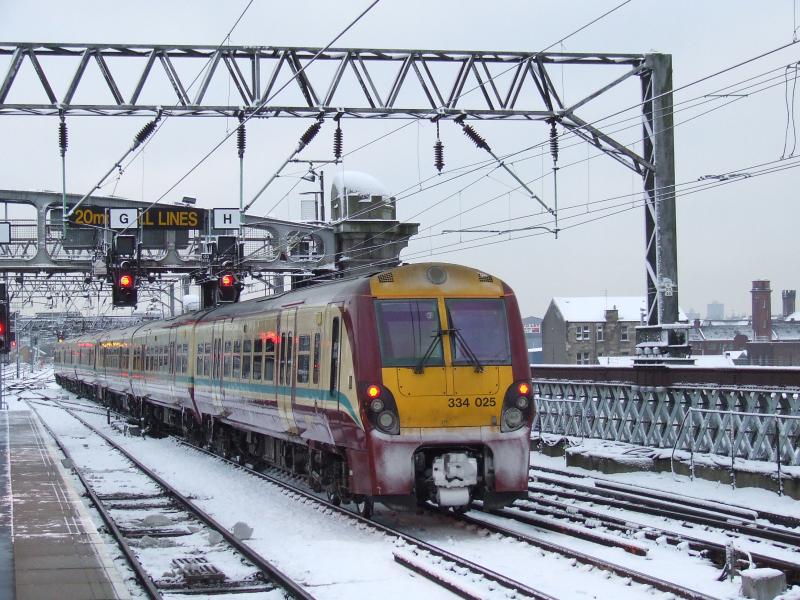 334 in the snow at Glasgow Central: 3340025 departing for Ardrossan Town on 9th February 2009 Photo of 334 in the snow at Glasgow Central