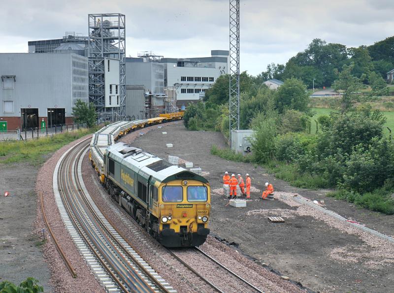 Cameron Bridge 66562: Freightliner 66562 runs through the site of the closed Cameron Bridge station with new concrete sleepers on 25 July. Photo of Cameron Bridge 66562