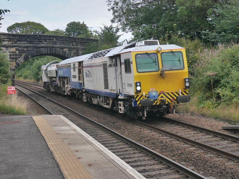 Dalgety tamper: SB Rail tamper DR77001 passes through Dalgety Bay heading to Slateford Depot from 'Methil West' on 1 September. Photo of Dalgety tamper