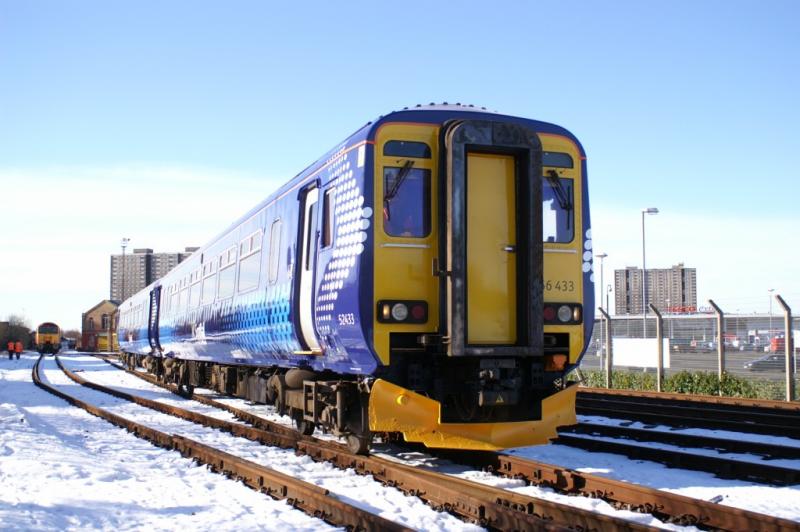 156433: 156433 the first unit to be Rebranded stands in the yard at Railcare Springburn on the 11th February prior to its journey back to Corkerhill. Photo of 156433