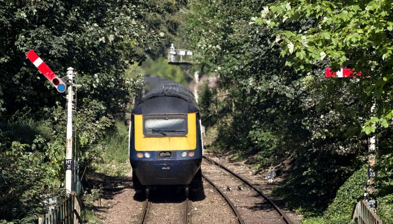 HUNTLY HST (3).jpg: AND BANG ON TIME DISAPPEARS INTO THE JUNGLE AT HUNTLY.
FIRST TIME I HAVE SEEN RUST MARKS ON AN HST POWER CAR. Photo of HUNTLY HST (3).jpg