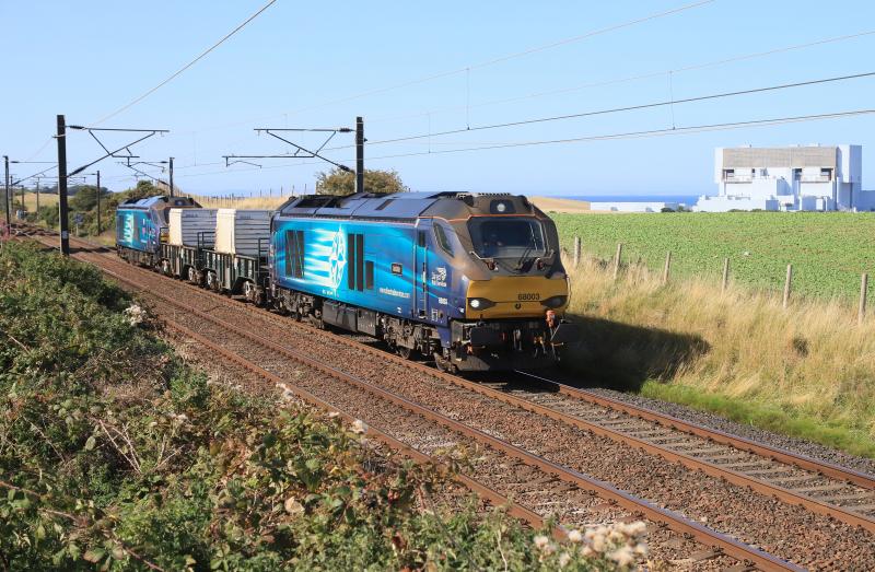 6M50: 68003 leading topn tail 68034 on 6M50 14.52 Torness P Stn. to Carlisle Kingmoor rapproaching Innerwick G.s.p. on 05/09/2023 Photo of 6M50