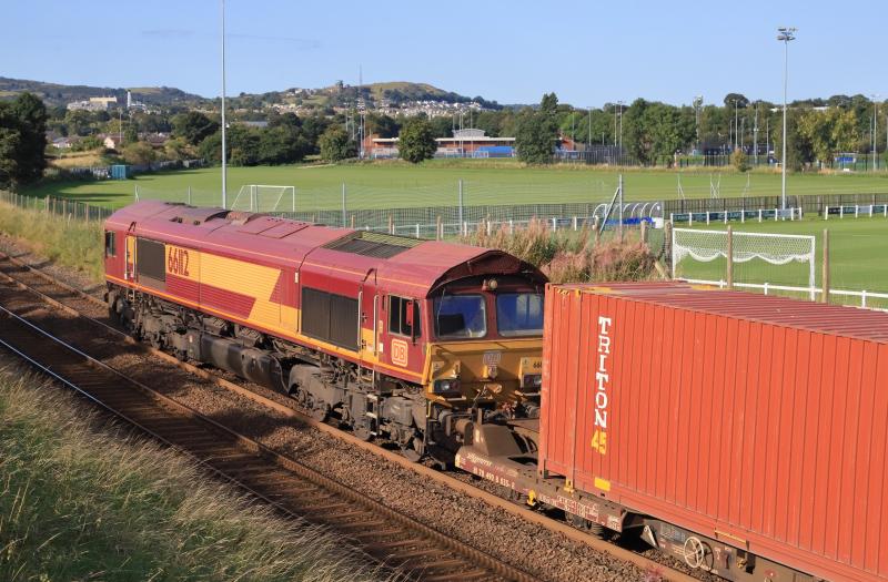 4E96: 66112 on the rear of 4E96 09.00 Mossend Euroterminal to South Bank Tees Dock BSC Export Terminal passing Peffermill Playing Fields on 12/09/2023 66168 on the front Photo of 4E96