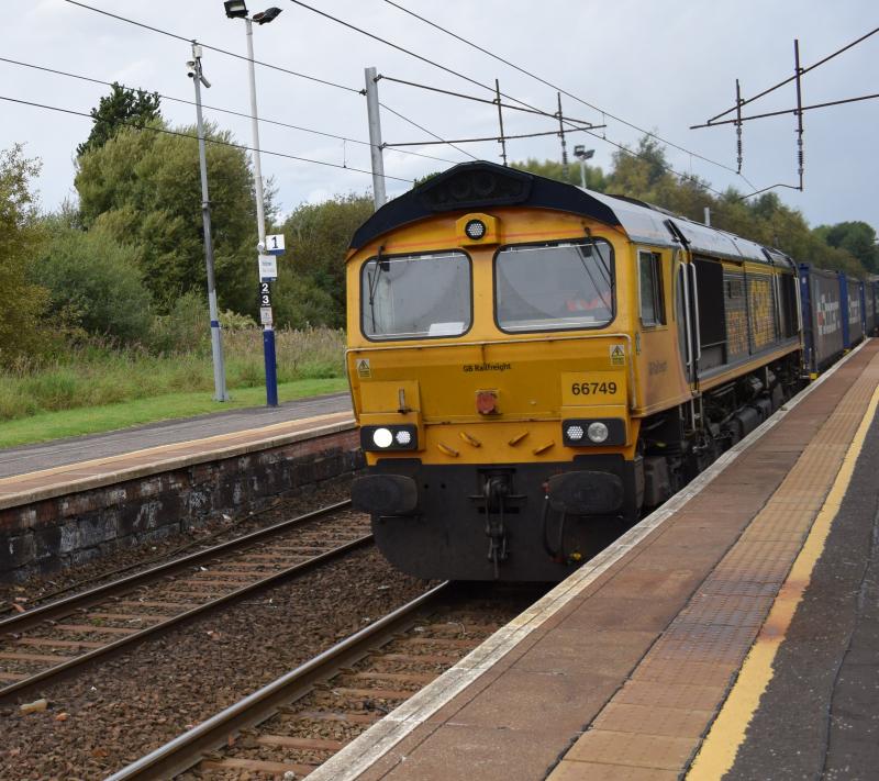 66749 on 4E04 13.9.23: 66749 on 4E04 passing through Holytown on 13.9.23 running some 41 mins late Photo of 66749 on 4E04 13.9.23