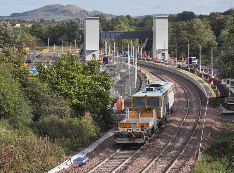Cameron Bridge tamper: A tamper works at the new Cameron Bridge station on 6 October. Photo of Cameron Bridge tamper