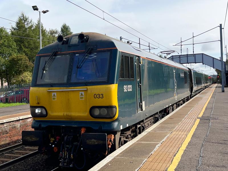 Early to Bed & Late to Rise: Caledonian Sleeper teal liveried 92033 leads a very late running 5B26 Edinburgh - Polmadie through Holytown, diverted via Shotts. (20/09/2023) Photo of Early to Bed & Late to Rise