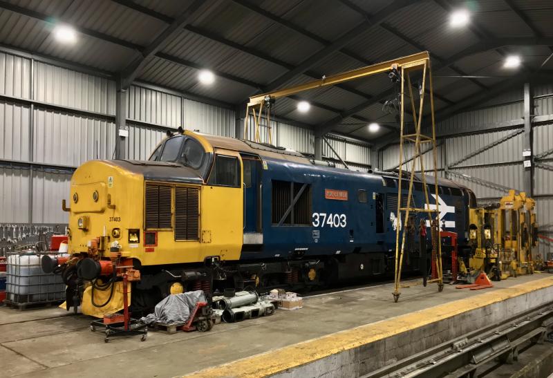 37403 Boness MMPD: 37403 inside the Boness diesel shed with roof removed for some minor work to the exhaust manifold.
The loco should be back in service soon.
Photo 16th November 2023. Photo of 37403 Boness MMPD