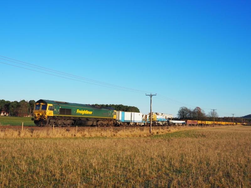 66506 on 6K40: 66506 Crewe Regeneration heads engineers train including Balfour Beatty crane south through Bow of Fife LC, Boxing Day, 2023 Photo of 66506 on 6K40