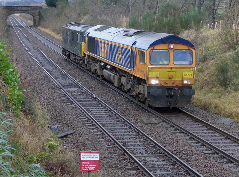 Dalgety 66 and 73: Caledonian Sleeper 66771 and 73969 approach Aberdour returning from Craigentinny to Inverness after their Christmas break. They only reached Kirkcaldy before being sent back because of line closures further north. Photo of Dalgety 66 and 73