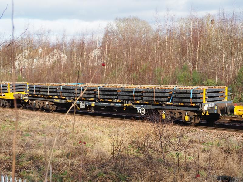KFA loaded with composite sleepers: Bound for the Moncrieff Tunnel job - pictured at Tesco, Perth. Photo of KFA loaded with composite sleepers