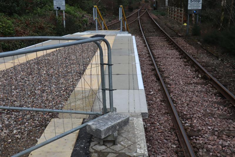 Arrochar North End - Right: Taken on 2/3/24. View of RHS to the north end of Arrochar platform. According to plans the edging should be flush with existing edging. Photo of Arrochar North End - Right