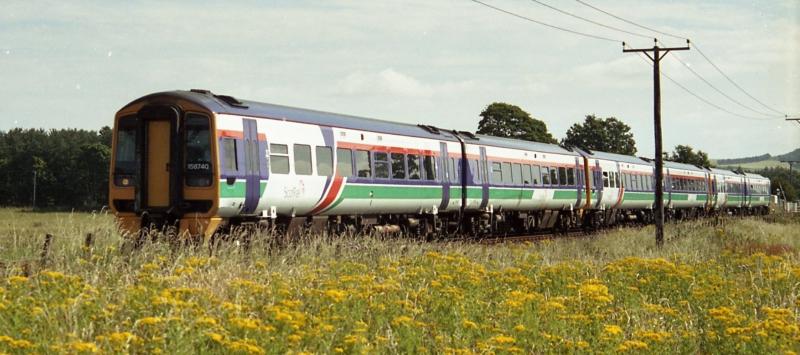 Photo of Three Class 158's in Scotrail Swoosh Livery