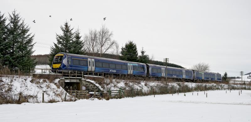 170404 INSCH 12.1.25.jpg: ON TIME ALL THE WAY WITH 12.31 IS-ABDN SEEN LEAVING INSCH.
NOTE TELEGRAPH POLES STILL IN USE.THE PIDGEONS ARE REAL! Photo of 170404 INSCH 12.1.25.jpg