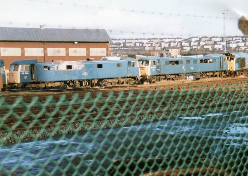 85001 & 39 Await Their Fate: 85001 & 39 Sit on MC Metals yard awaiting their time to go into the history books. Pic dated 26th Jan 1989 Photo of 85001 & 39 Await Their Fate