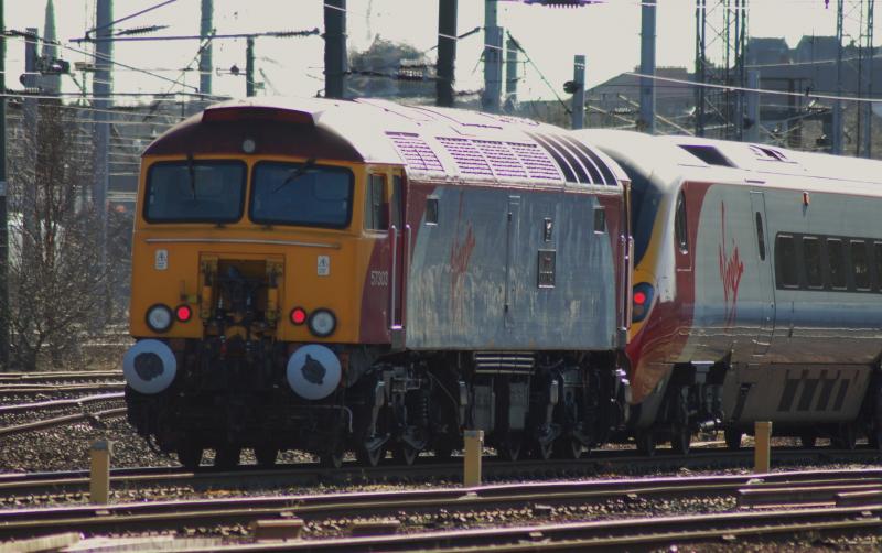 57303 & UID 390??? at PO For Filming: 57303 Connected to UID 390 in PO Down sidings during filming for Virgin
57 being used to shunt as 390 not under the wires Photo of 57303 & UID 390??? at PO For Filming
