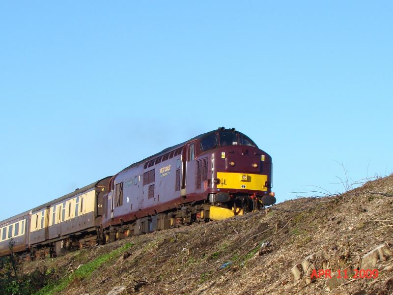 37676 on 1Z18 attacks the bank after Craigendoran Junction: 37676 on 1Z18 attacks the bank after Craigendoran Junction. Photo of 37676 on 1Z18 attacks the bank after Craigendoran Junction