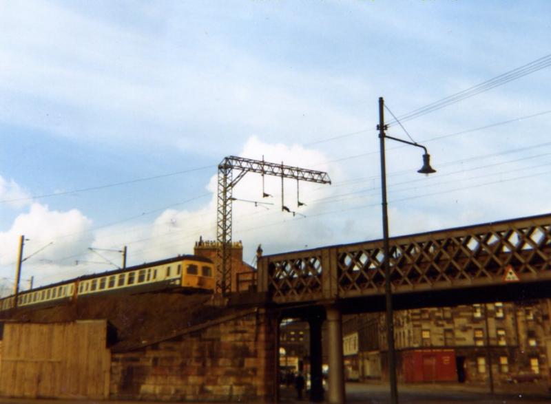 The scenic route: Partick as was; at the site of the present day station a Swindon Inter City unit passes in March 1971 on its way from Hyndland Loop to Queen Street to form an Edinbugh via Bathgate train-Sunday of course....... Photo of The scenic route