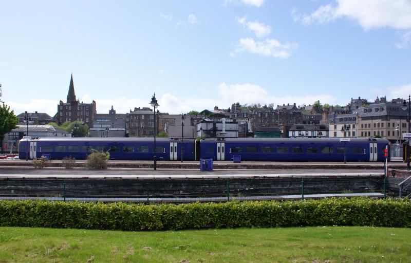 Unliveried: This two-car DMU lies static at Stirling Station and has no decals of First Scotrail. Photo of Unliveried