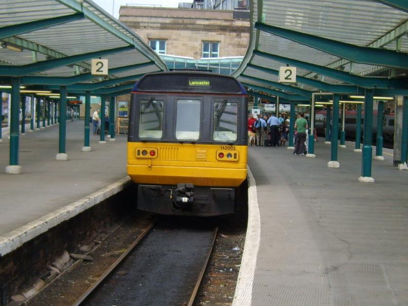 All Change: 142003 stands in bay platform at Carlisle having just arrived off the Cumbrian Coast Line. Photo of All Change